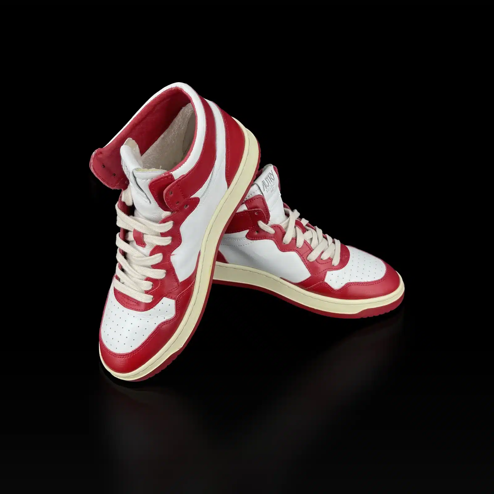 Crossed Autry Medalist Mid sneakers in white and red, front view