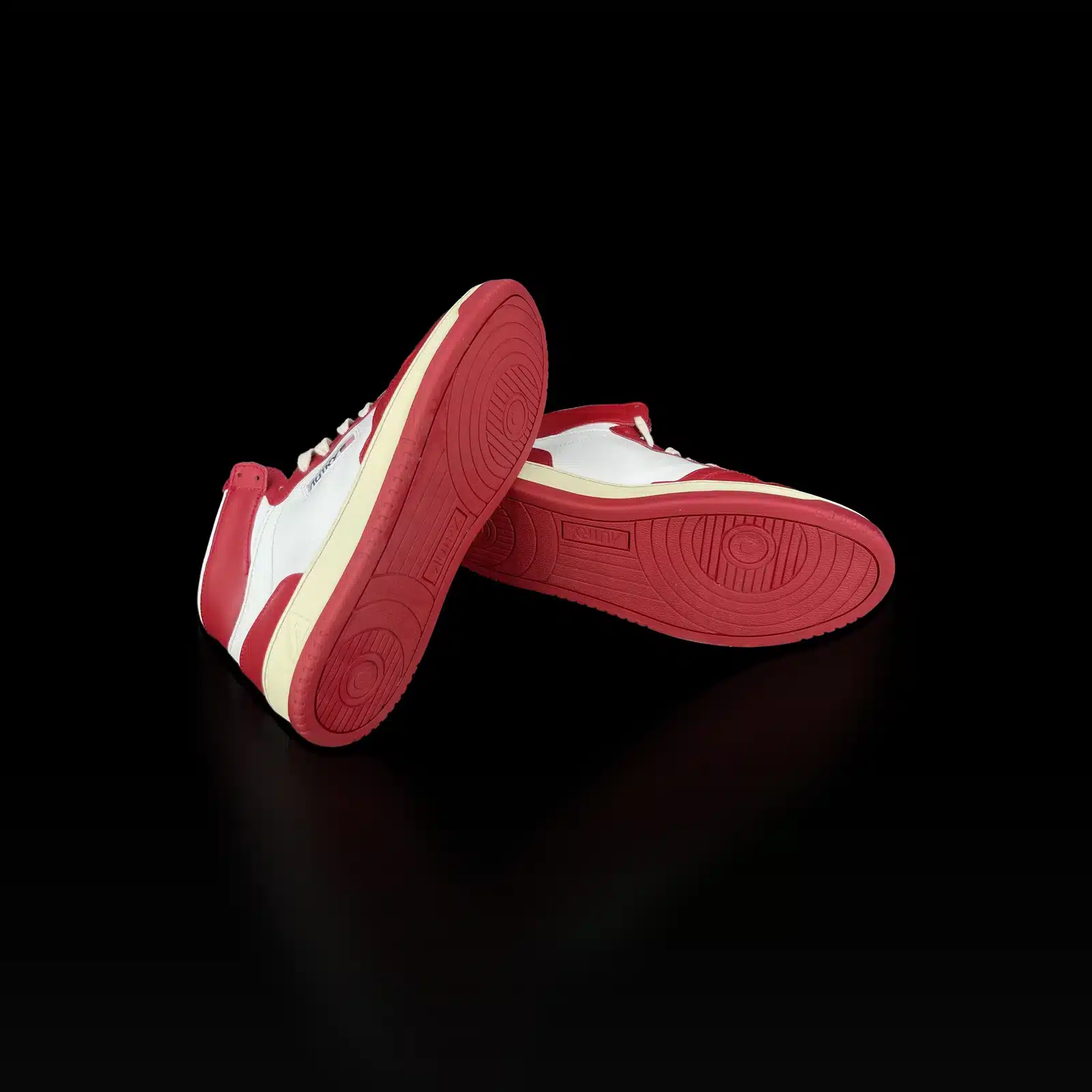 Red soles of Autry Medalist Mid sneakers