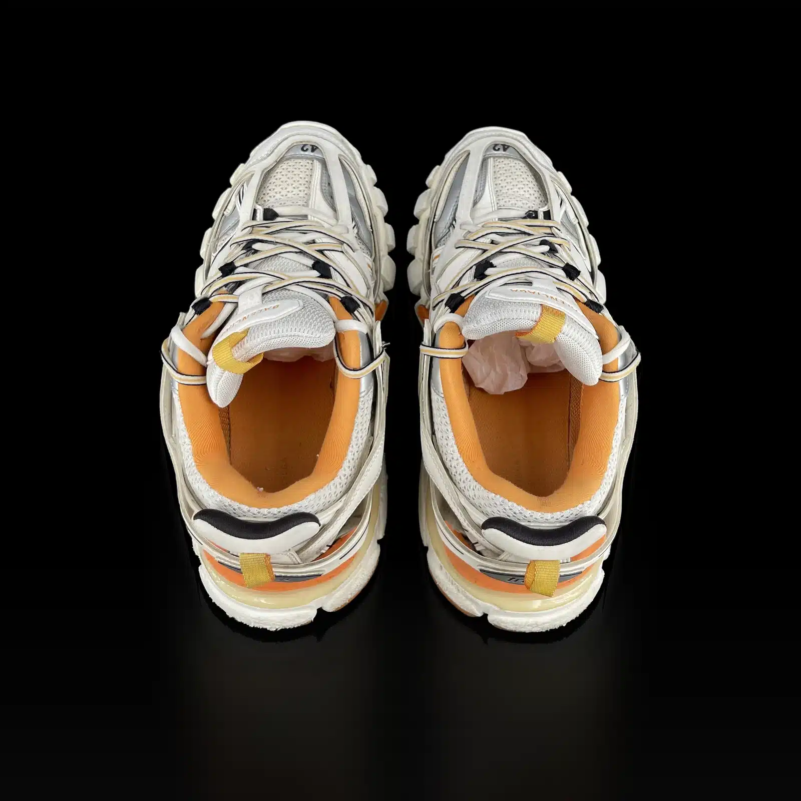 Baskets Balenciaga Track blanc et orange vues de dessus, doublure orange