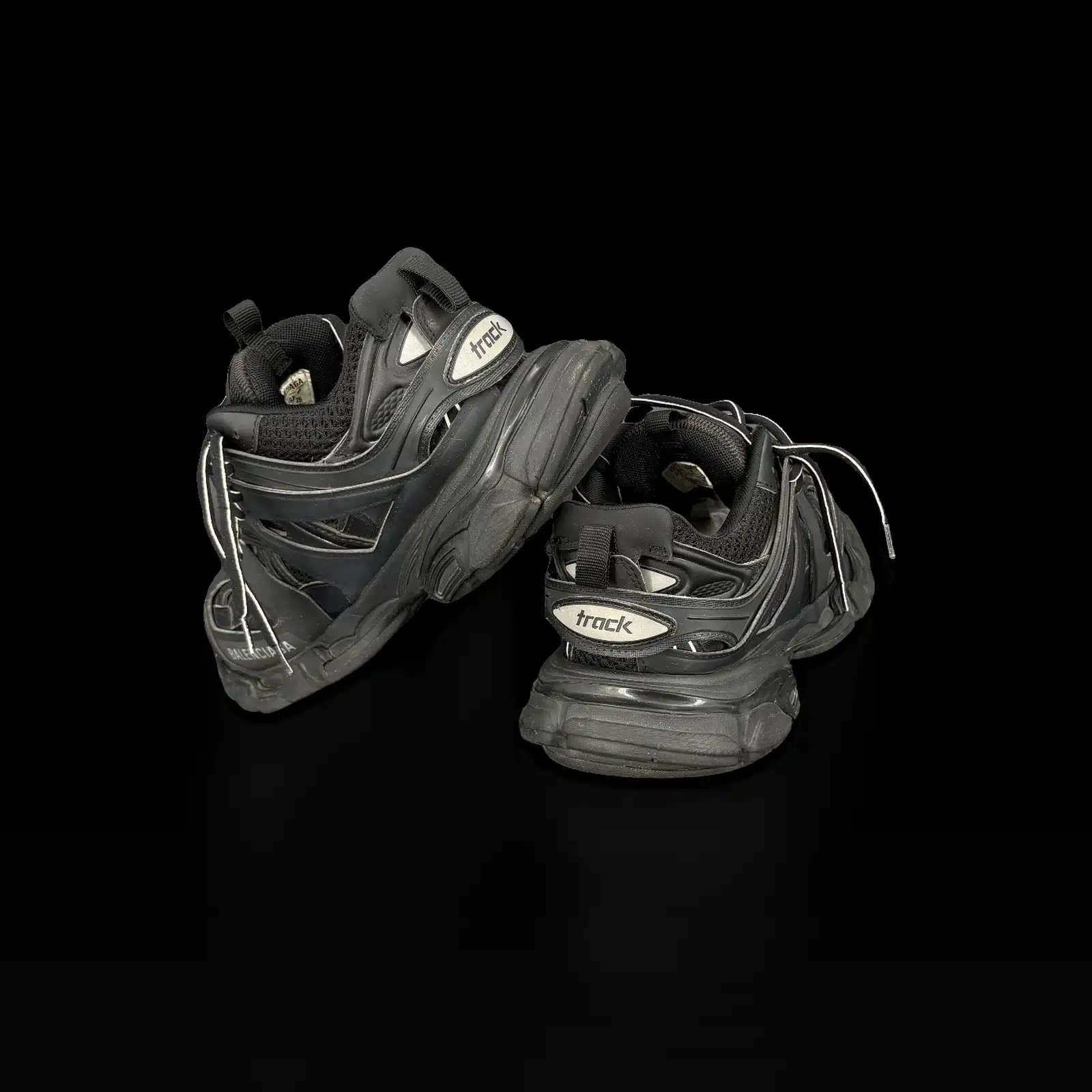 Talons des baskets Balenciaga Track noires avec plaques track réfléchissantes