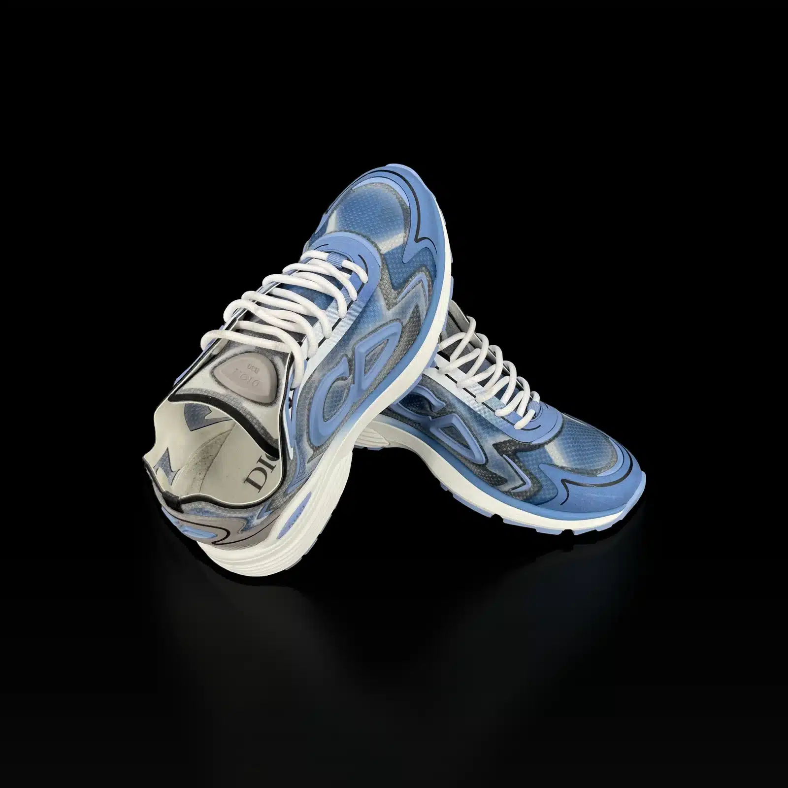 Paire de baskets Dior B30 croisées, logo CD bleu ciel et lacets blancs