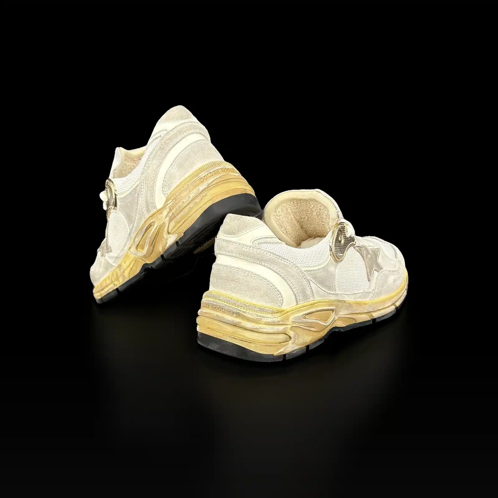 Talons des baskets Golden Goose Dad-Star, semelle dorée effet vieilli