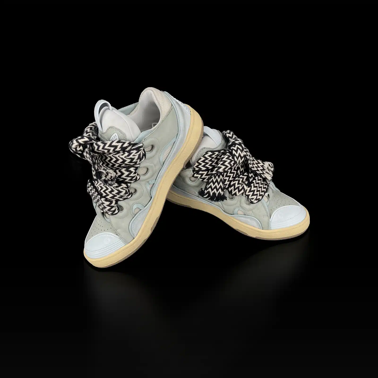 Paire de baskets Lanvin Curb vert d'eau, l'une posée sur l'autre