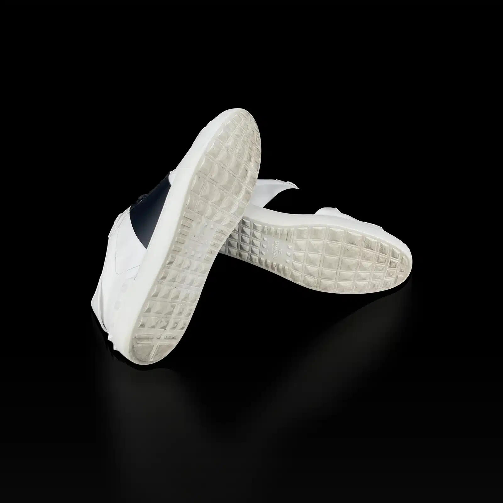 Semelles cloutées blanches des baskets Valentino Open