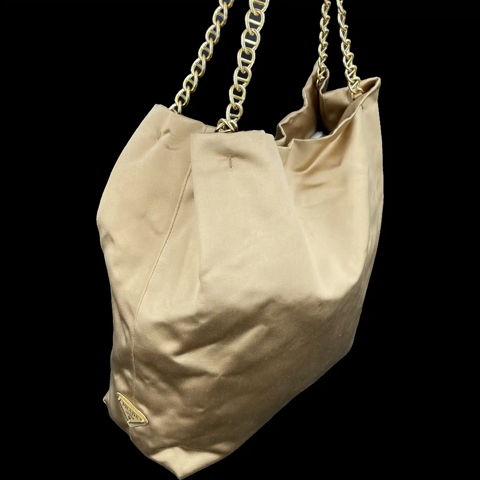 Bottom of the Prada gold satin tote