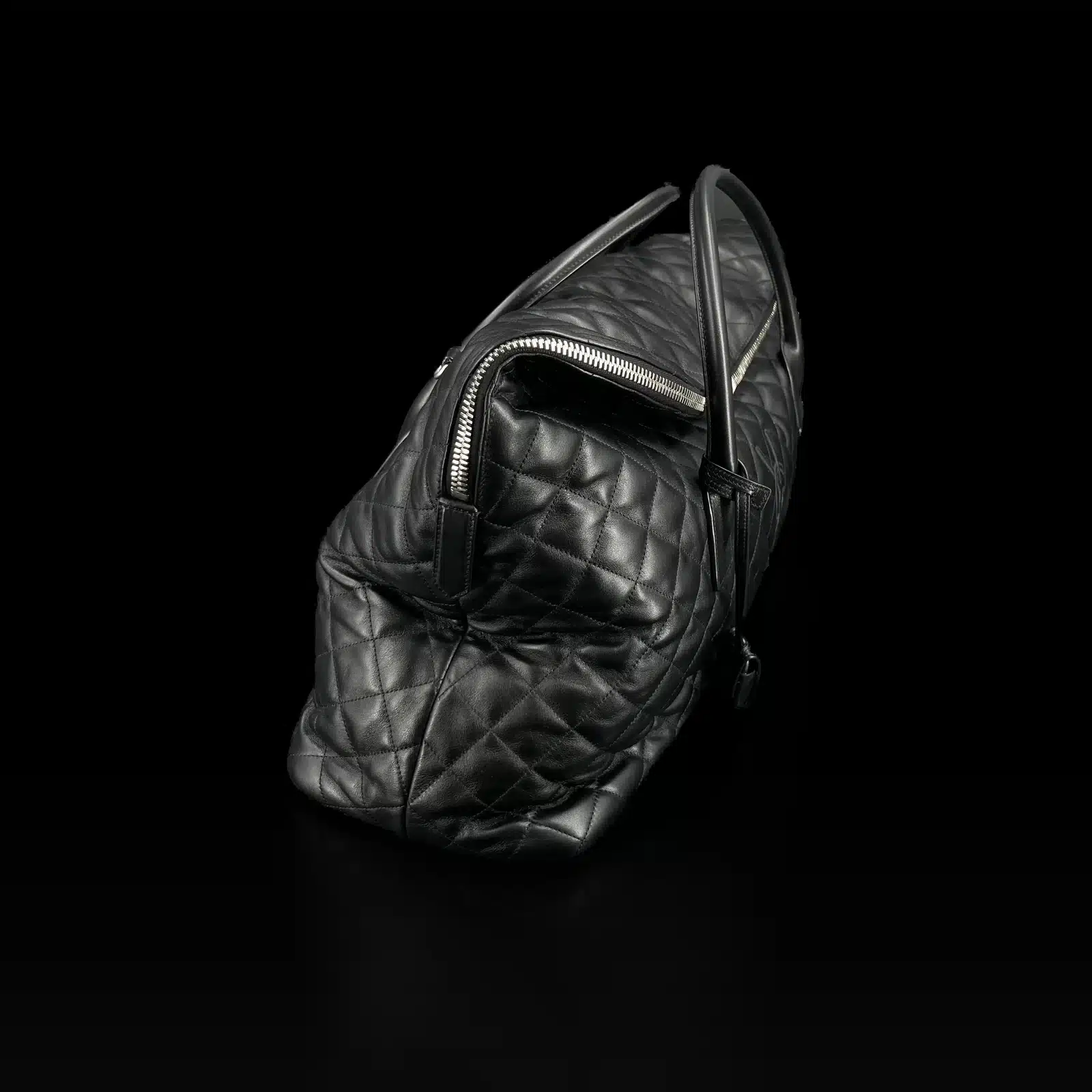 Côté du sac Saint Laurent ES Giant en cuir matelassé noir avec clochette