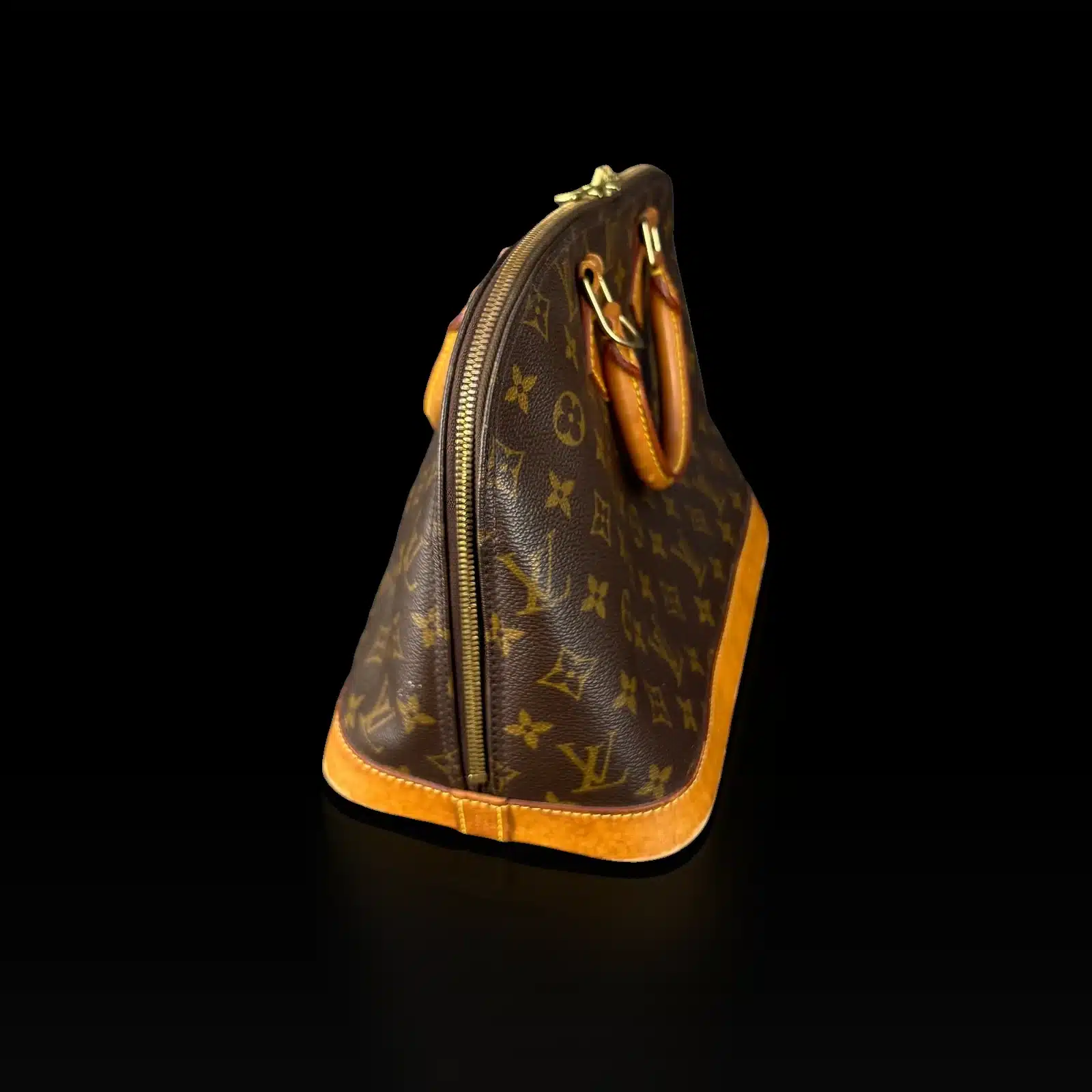 Sac Louis Vuitton Alma Monogram, vue de côté