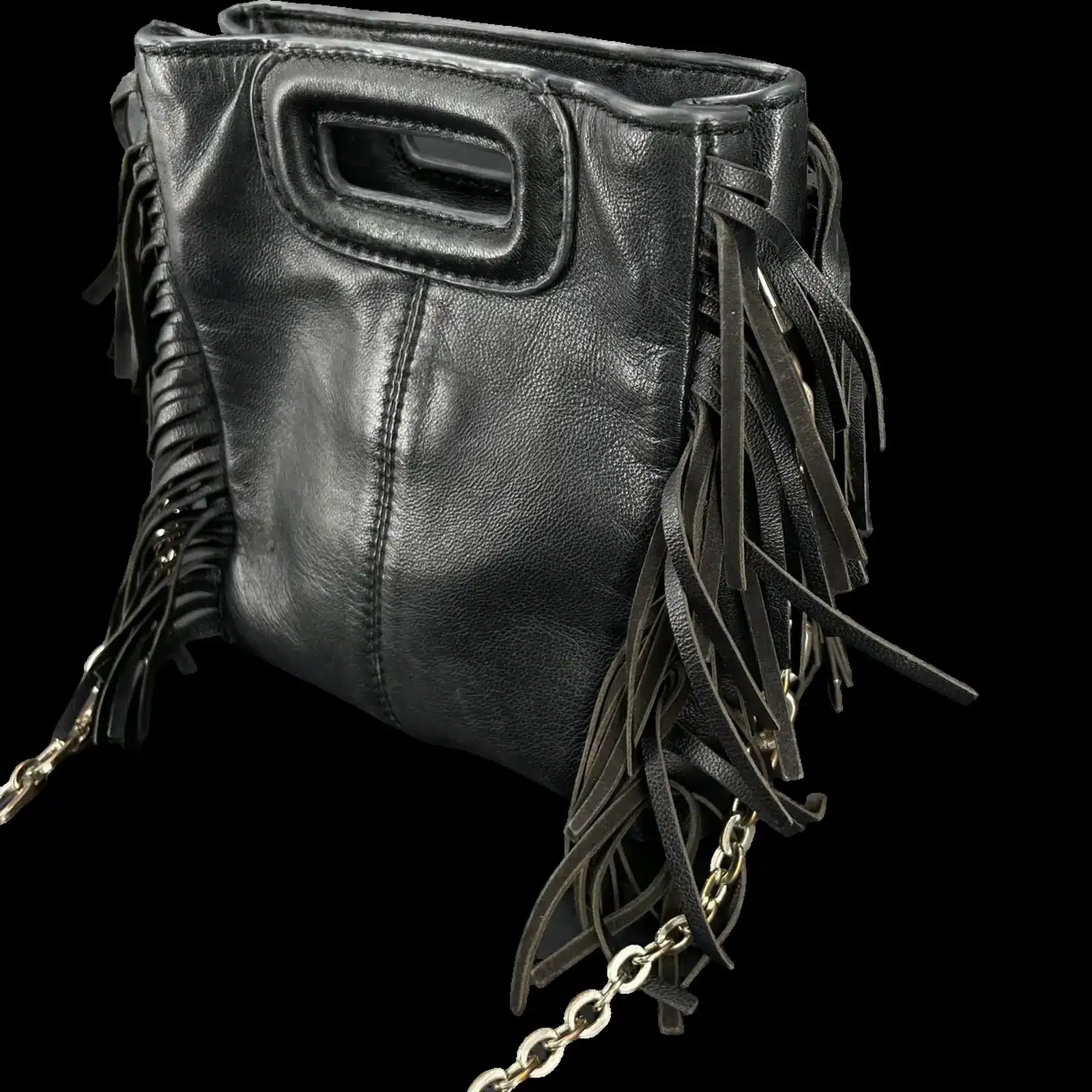 Sac Maje M Mini noir vu de trois quarts arrière, franges en cuir