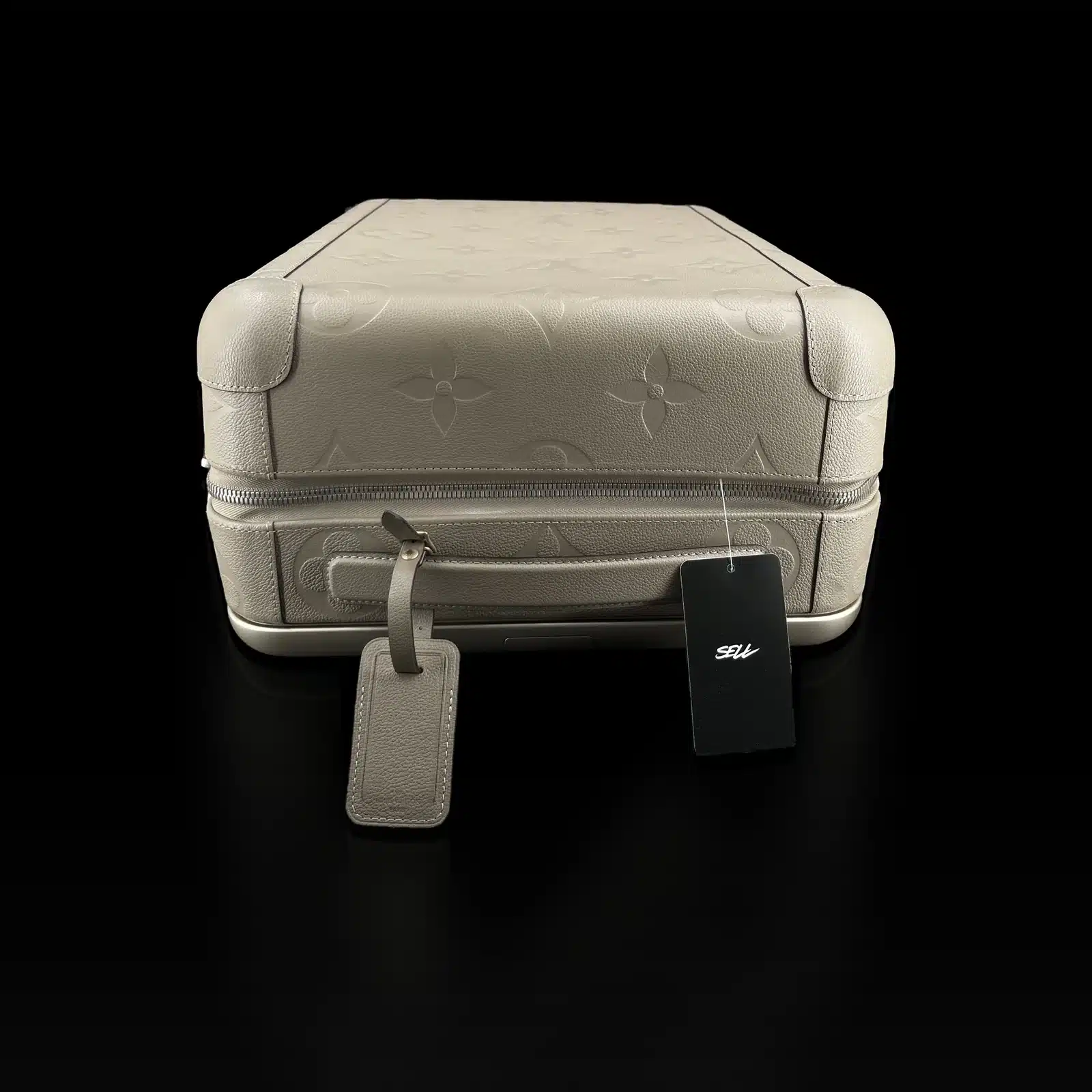 Dessus de la valise Louis Vuitton Horizon 55 avec poignée et porte-adresse en cuir tourterelle